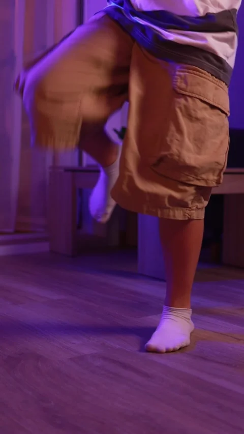 Teenage dancer practicing dynamic hip hop moves with fluid precision, movin.. Stock Footage 305479984