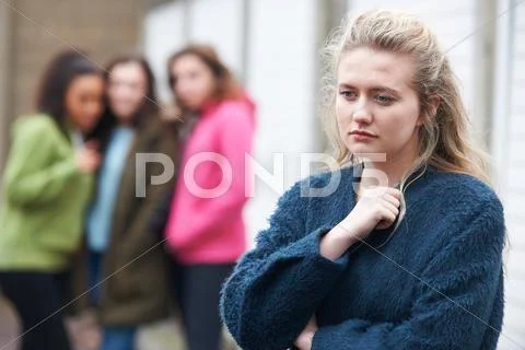 Teenage Girl Being Talked About By Peers Stock Photos