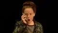 Teenage girl gets funny gossip during phone call HD Footage