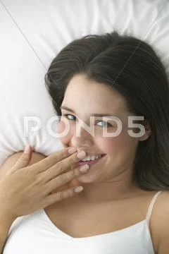 Teenage girl giggling Stock Photos