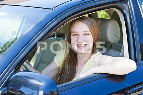 Teenage girl learning to drive Stock Photos