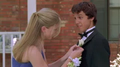 Boy Man GIVING CORSAGE Girl Teen Prom Co, Stock Video