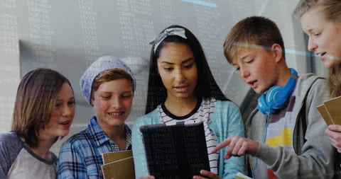 Teenage girl tapping tablet in coding lab projecting transparent code while Stock Footage 312298342