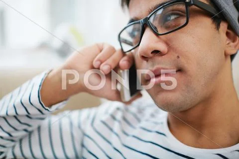Teenage guy speaking on cellphone Stock Photos