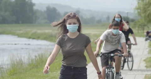 Teenage kids wear masks outdoor healthy lifestyle, coronavirus,covid 19 concept Stock Footage
