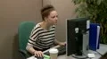 Teenage Office worker acting suspiciously HD Footage