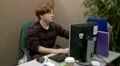 Teenage office worker checking files in the office HD Footage