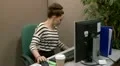 Teenage office worker has a computer problem HD Footage
