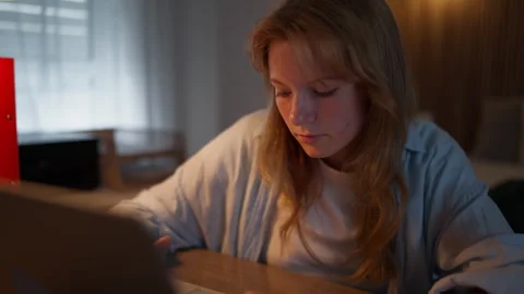 Teenage student using a computer for online education at home. Digital lear.. Stock Footage 342044412