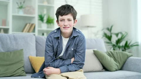The teenager boy suffers from severe abdominal pain, nausea, poisoning  Stock Footage 238633341