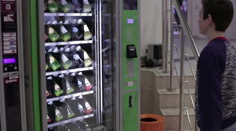 Teenager buys lemonade machine Video stock 59557592