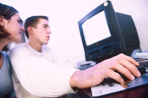  Teenager at a computer Model release for restricted use. Do not use to re... 스톡 사진