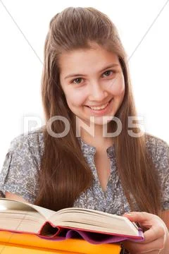 Teenager girl with books Stock Photos