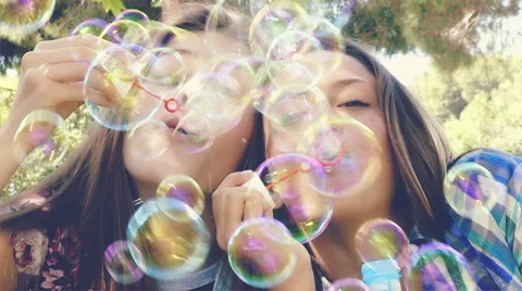 Teenager having fun with soap bubbles closeup Stock Footage 51308992