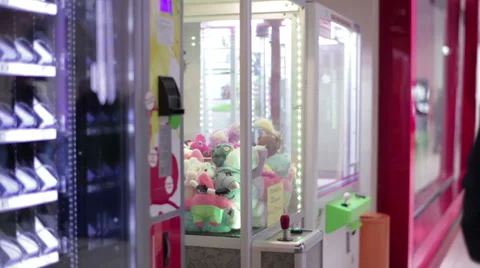 Teenager playing with toys Machine Stock Footage 59341864