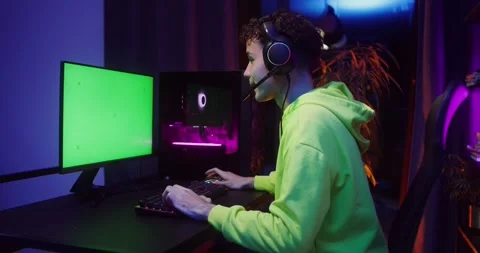 A teenager plays computer games while sitting in. Stock Footage 318996746