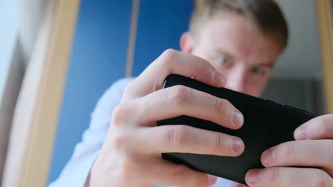 teenager-plays-dynamic-online-video-footage-126862145_iconl.jpeg