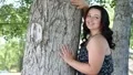 Teenager posing near tree HD Footage