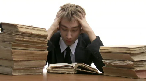 Teenager reads book Stock Footage