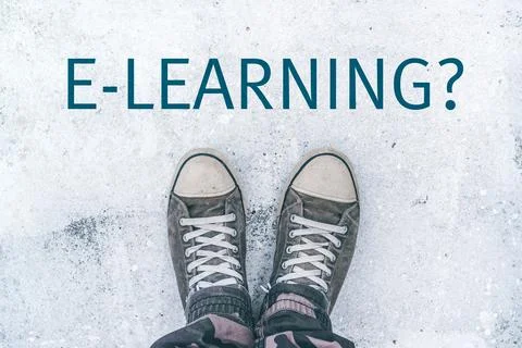 Teenager standing over e-learning title on street Stock Photos