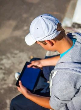 Teenager with Tablet Computer Stock Photos