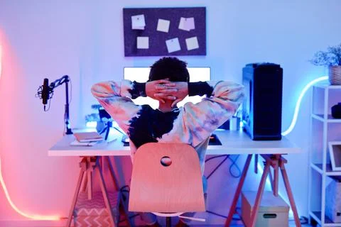 Teenager using Computer at Night Stock Photos