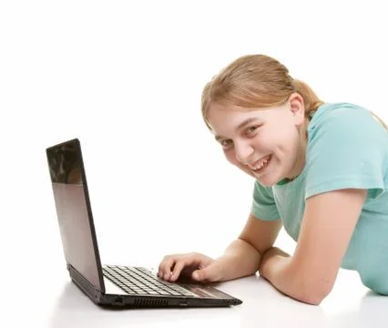 Teenager using a notebook Stock Photos