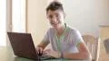 Teenager writing on his personal notebook HD Footage