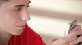 Teenager writing messages on the smartphone (close up) HD Footage