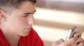 Teenager writing messages on the smartphone HD Footage