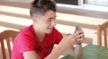 Teenager writing messages on the smartphone HD Footage