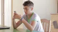 Teenager writing messages on the smartphone HD Footage