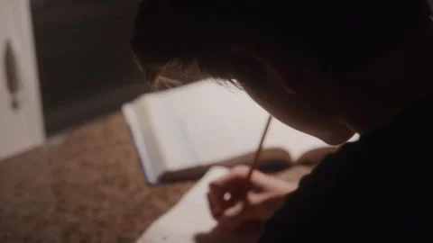 Teenager Writing Notes While Studying 스톡 동영상 208799208