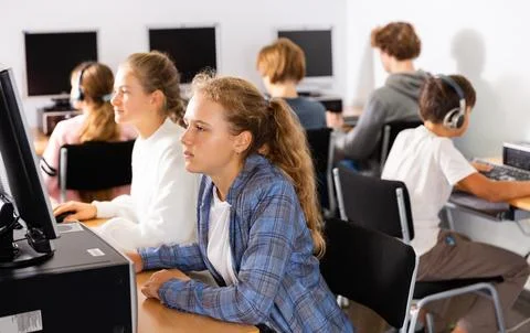 Teenagers in computer class Stock Photos