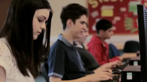 Teenagers in computer room Stock Footage 22664225