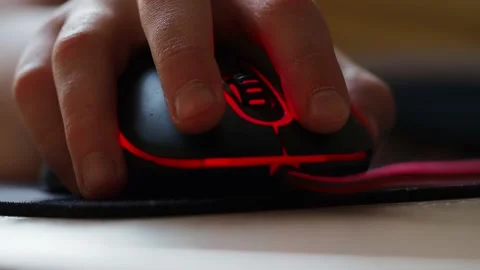 A teenager's hand with a computer mouse in close-up. Stock Footage 170651828