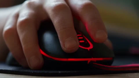 A teenager's hand with a computer mouse in close-up. Stock Footage 170651830