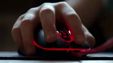 A teenager's hand with a computer mouse in close-up. Stock Footage 170652124