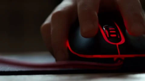 A teenager's hand with a computer mouse in close-up. Stock Footage 170660012