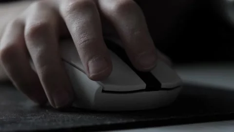 A teenager's hand with a computer mouse . Stock Footage 237744748