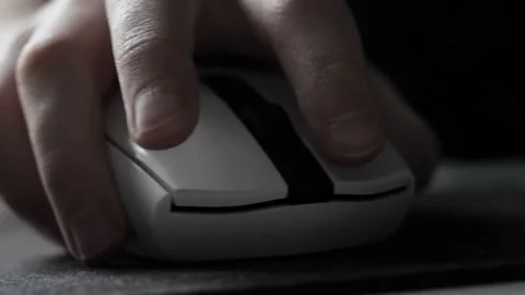 A teenager's hand with a computer mouse . Stock Footage 237744751
