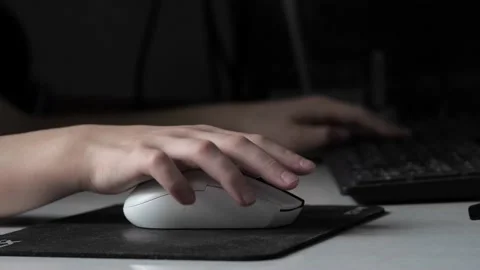 A teenager's hand with a computer mouse . Stock Footage 237744766