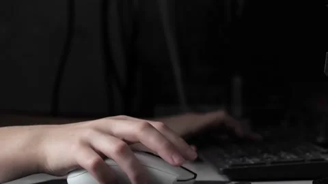 A teenager's hand with a computer mouse . Stock Footage 237744776