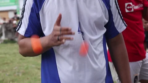Teenagers playing Clacker Balls, also known as Latto-Latto in Indonesia Stock Footage 231540341