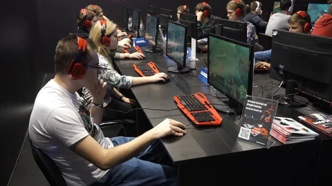 Teenagers playing video games on computers. Stock Footage 77268922