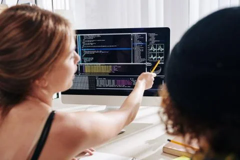 Teenagers studying programming Stock Photos