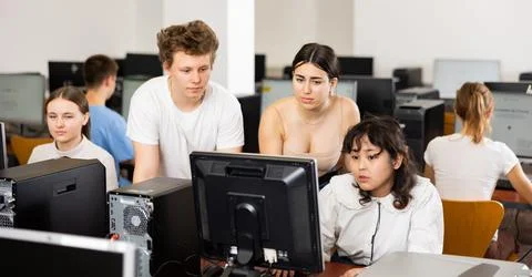 Teenagers using computer during computer science lesson 스톡 사진