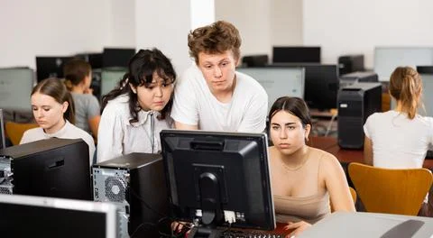 Teenagers using computer during computer science lesson 스톡 사진