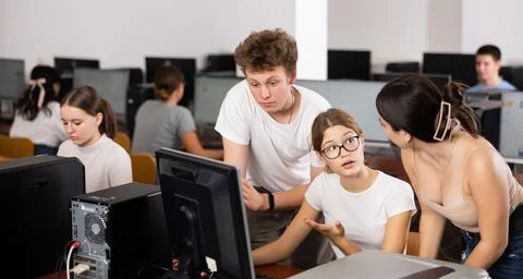 Teenagers using computer during computer science lesson 스톡 사진