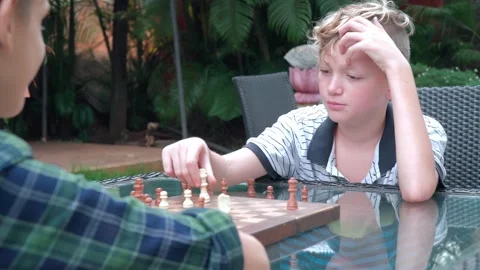 Teens are playing chess in the cafe Stock-Footage 168133399